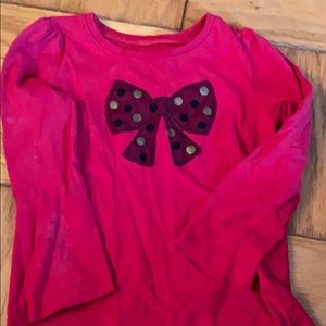 Red long sleeve shirt worn ones